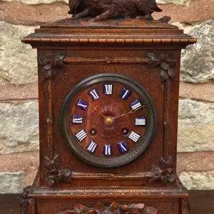 Stunning rare black forest carved mantle clock. German made circa 1870. Wonderful patina to the carved walnut case.