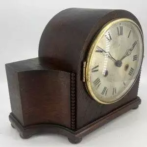 Lovely arts and crafts mantle clock by HAC ca 1905. Wonderful original metal HAC dial with original black hands.