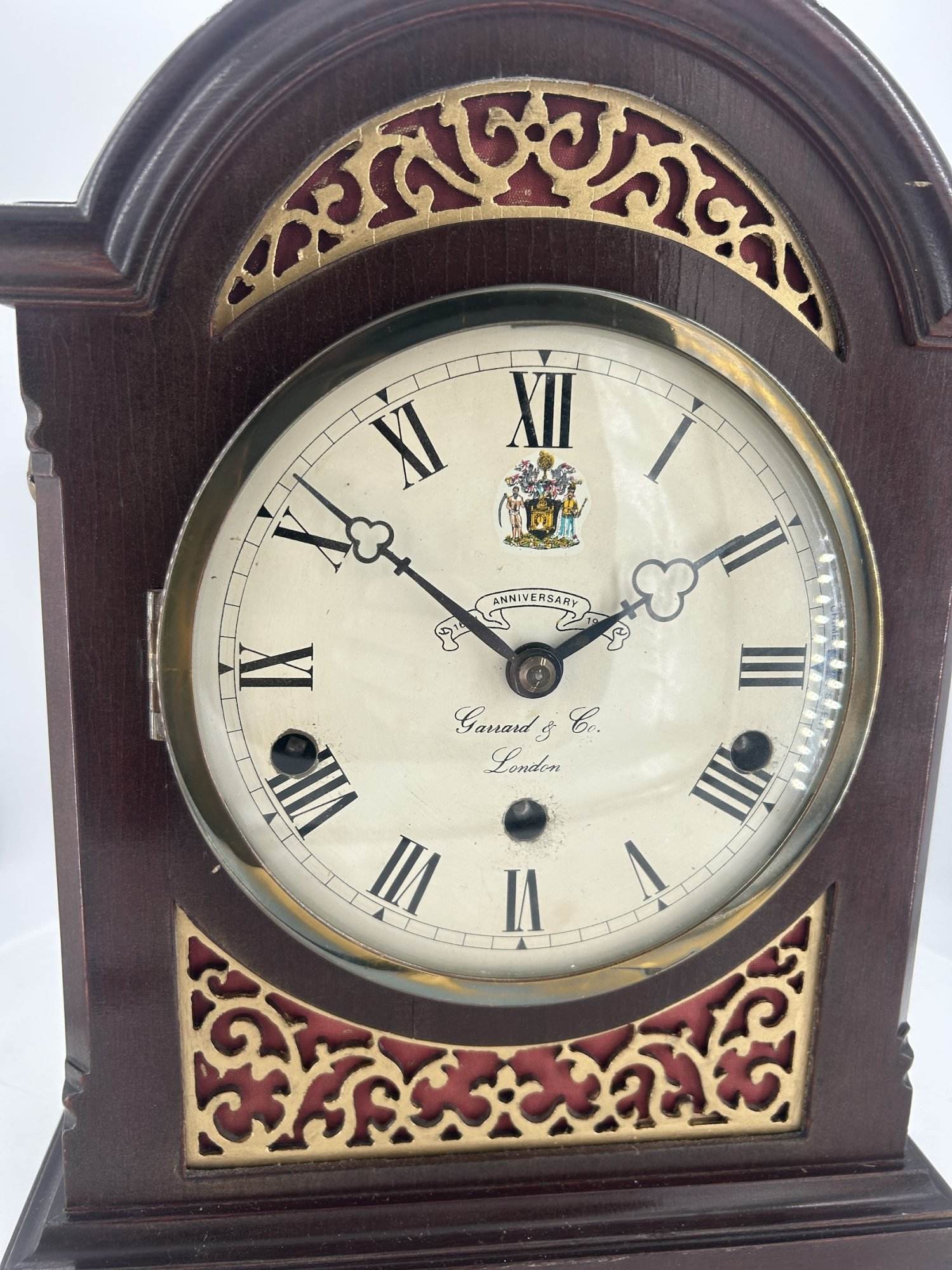 Stunning Elliot Exhibition Bracket clock ca 1985. Wonderful original dial and hands. Lovely fretwork side panels. The movement is a Elliot 8 day triple chime with engraving.