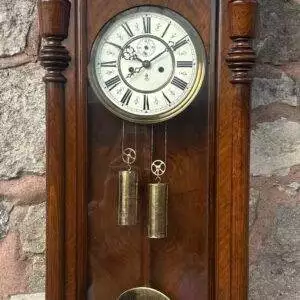 Exquisite Twin weight Vienna Wall clock made by Gustav Becker, ca 1890. Wonderful original enamel dial which has the Gustav Becker logo on and original hands. Classic walnut case with turned finials and stunning pediment.