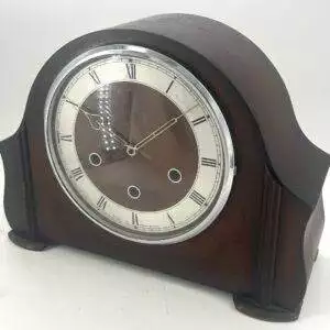 Retro Smiths 8 day Westminster chime Mantel Clock, ca 1940. Classic arched top case, original silver tone dial and matching hands with and chrome bezel. 8 day smiths empire Westminster chime movement.