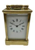 Gong Striking Carriage Clock, Large Model with Enamelled dial – French 8-Day Striking signed J Martin & Co131 Regent Street London.