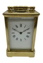 Gong Striking Carriage Clock, Large Model with Enamelled dial – French 8-Day Striking signed J Martin & Co131 Regent Street London.