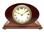 Bring a touch of refined Edwardian elegance to your space with this stunning antique mantel clock.
