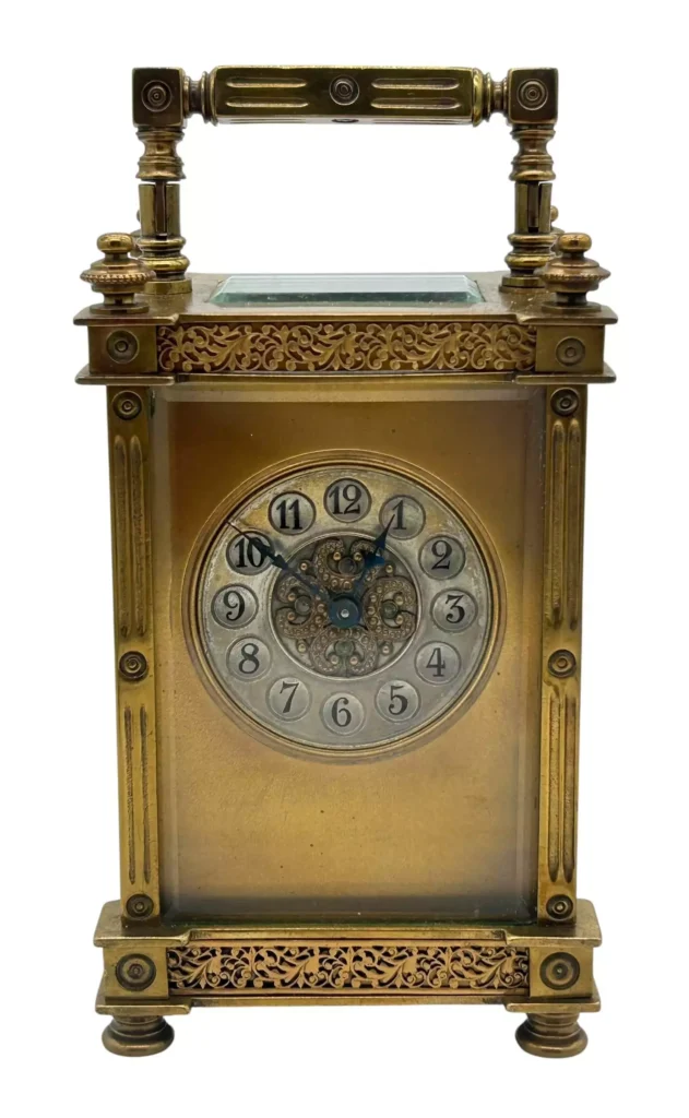 Antique masked dial French 8-day carriage clock