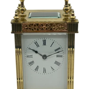 Highly Collectable Carriage Clock with fretwork decoration to all sides with enamel dial, French 8-Day Timepiece Movement.